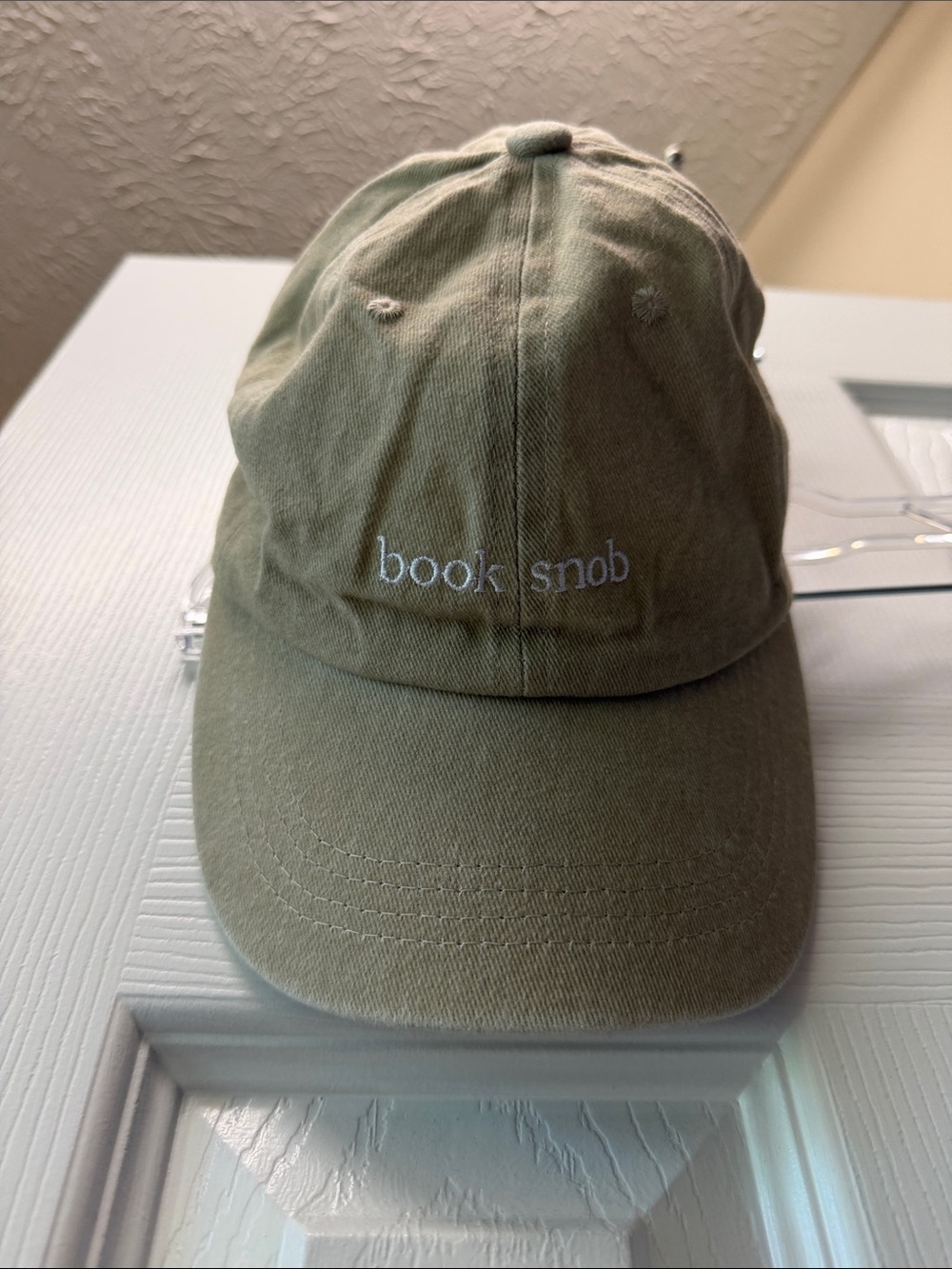 "book snob" khaki colored Dad Hat